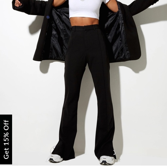 Black Dress Pants. Trendy flare shape at bottom with a split hem - Picture 2 of 2